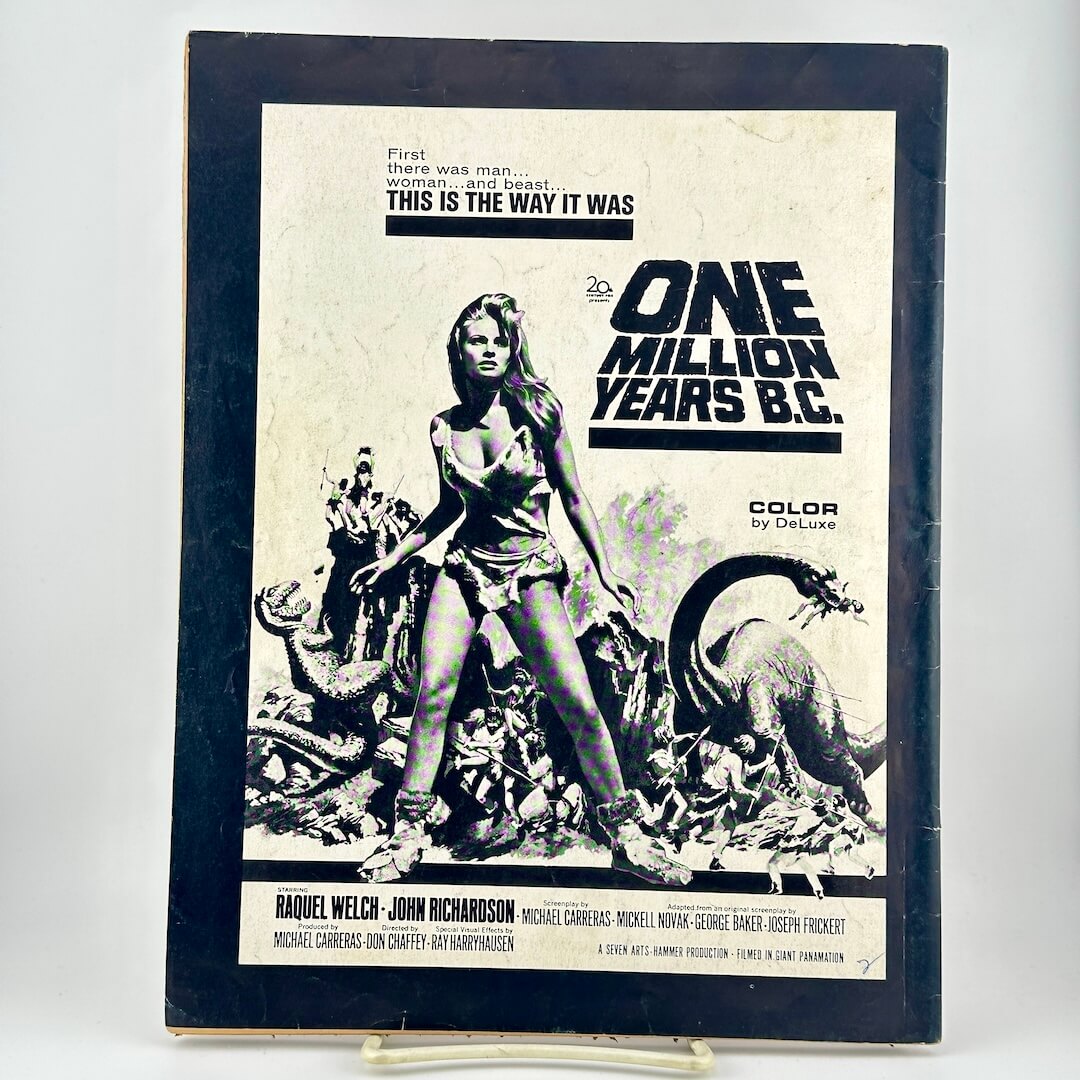 A vintage movie ad for 'One Million Years B.C. on back cover of magazine. 