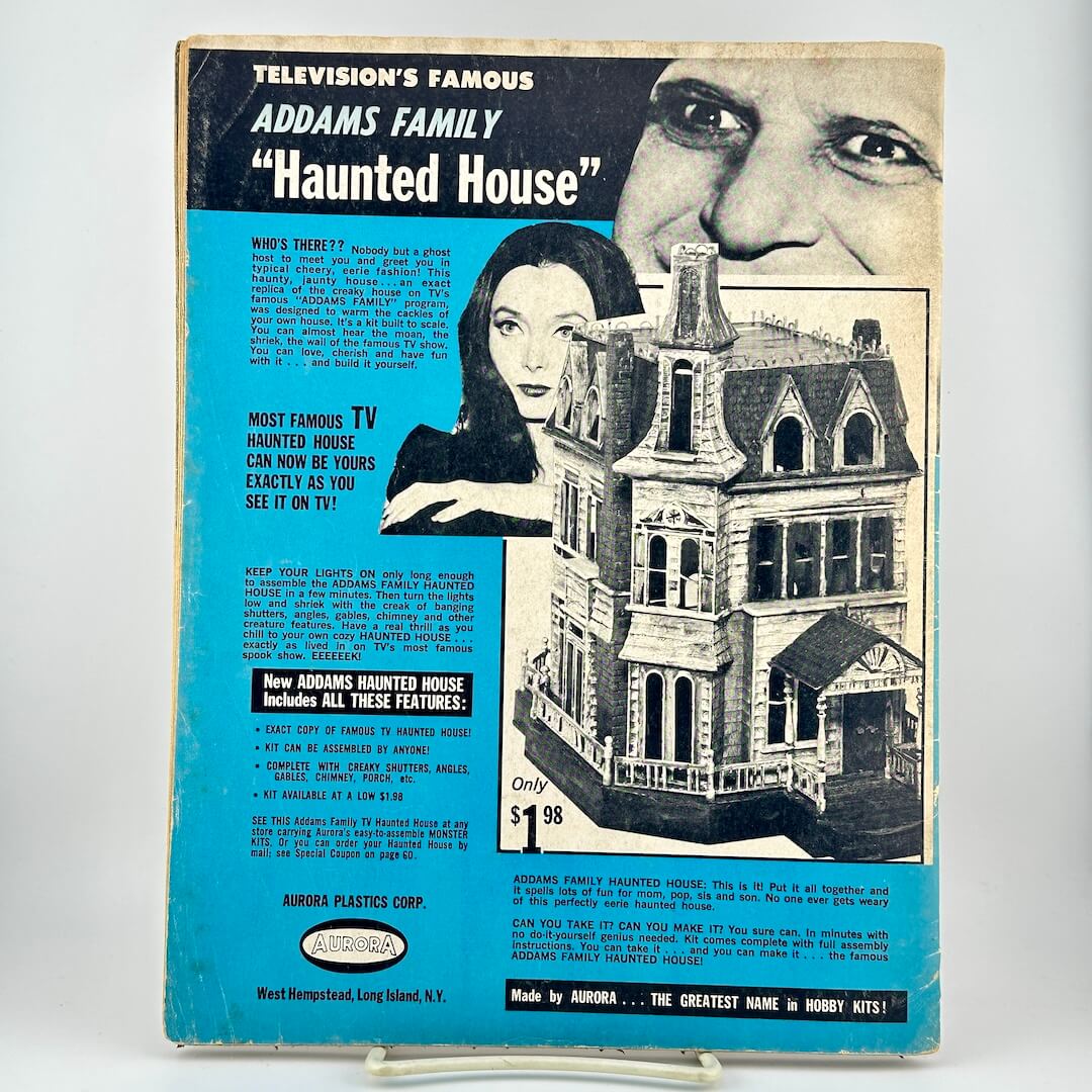 Back cover of vintage magazine with advertisement for Addams Family Haunted House playset. 