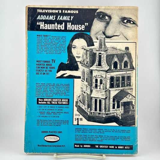Back cover of vintage magazine with advertisement for Addams Family Haunted House playset. 