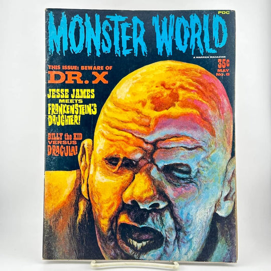 Vintage magazine titled "Monster World" with a large illustrated monster face on the cover. 