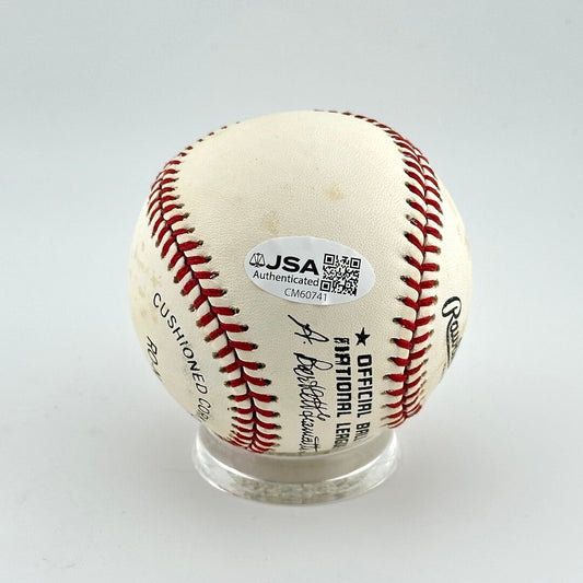 Baseball with JSA authentication label on a white background