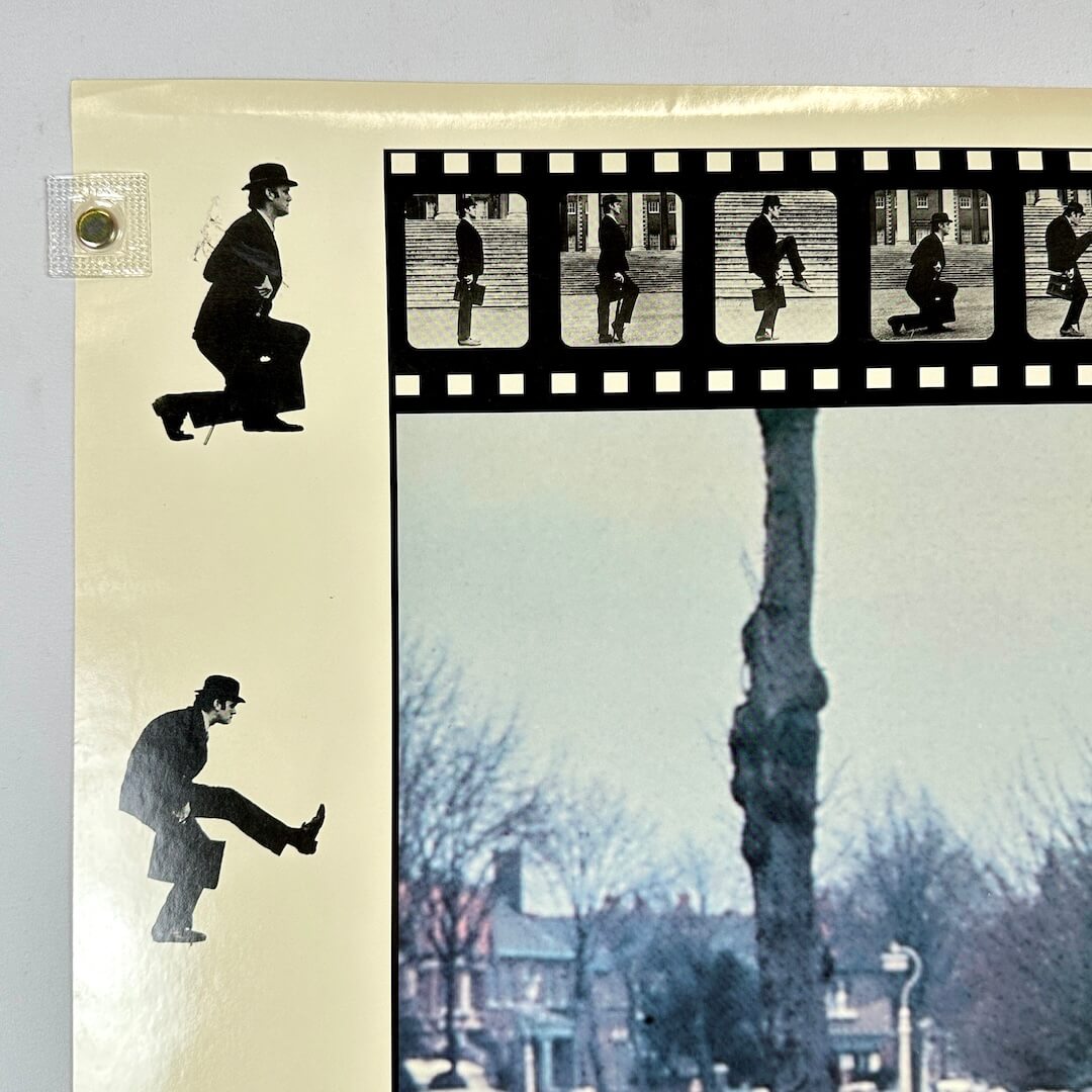 Top left corner of poster with pin holes but good corner.