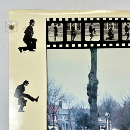 Top left corner of poster with pin holes but good corner.