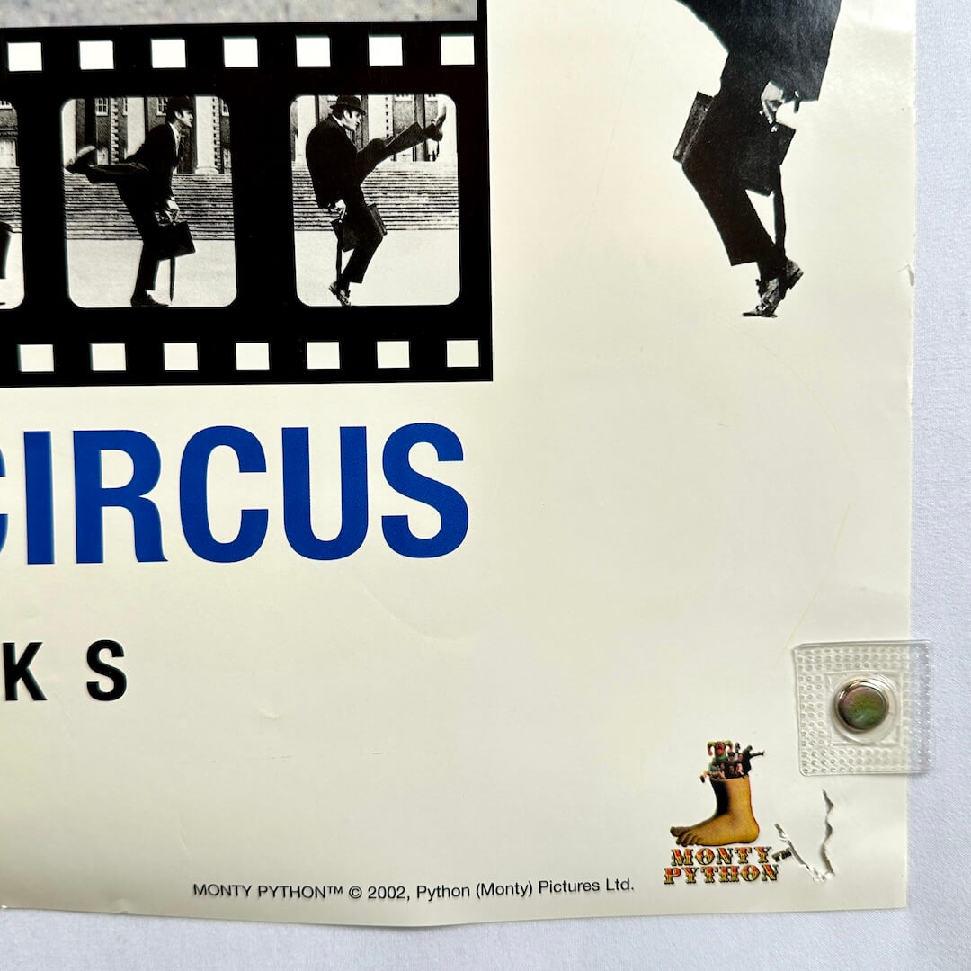 Bottom right corner with licensing information and pin holes