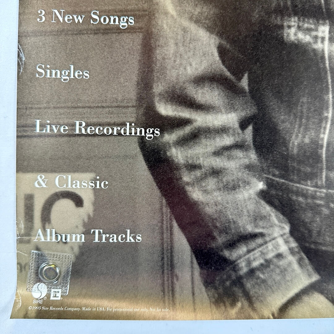 Bottom left corner with copyright information and some wear to edge. 