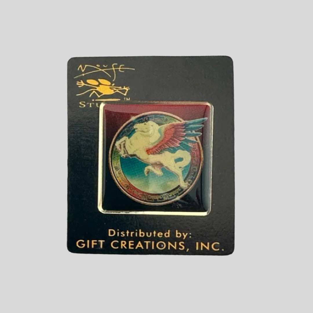 Hard enamel pin featuring a flying pegasus in front of a rainbow ring, on red to black ombre background.