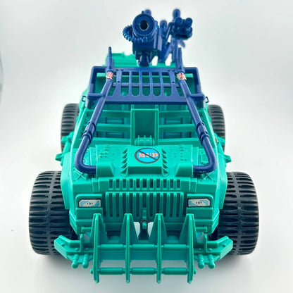 Toy vehicle with green body and blue accents on a white background