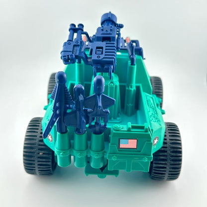 Toy vehicle with blue and green colors on a white background