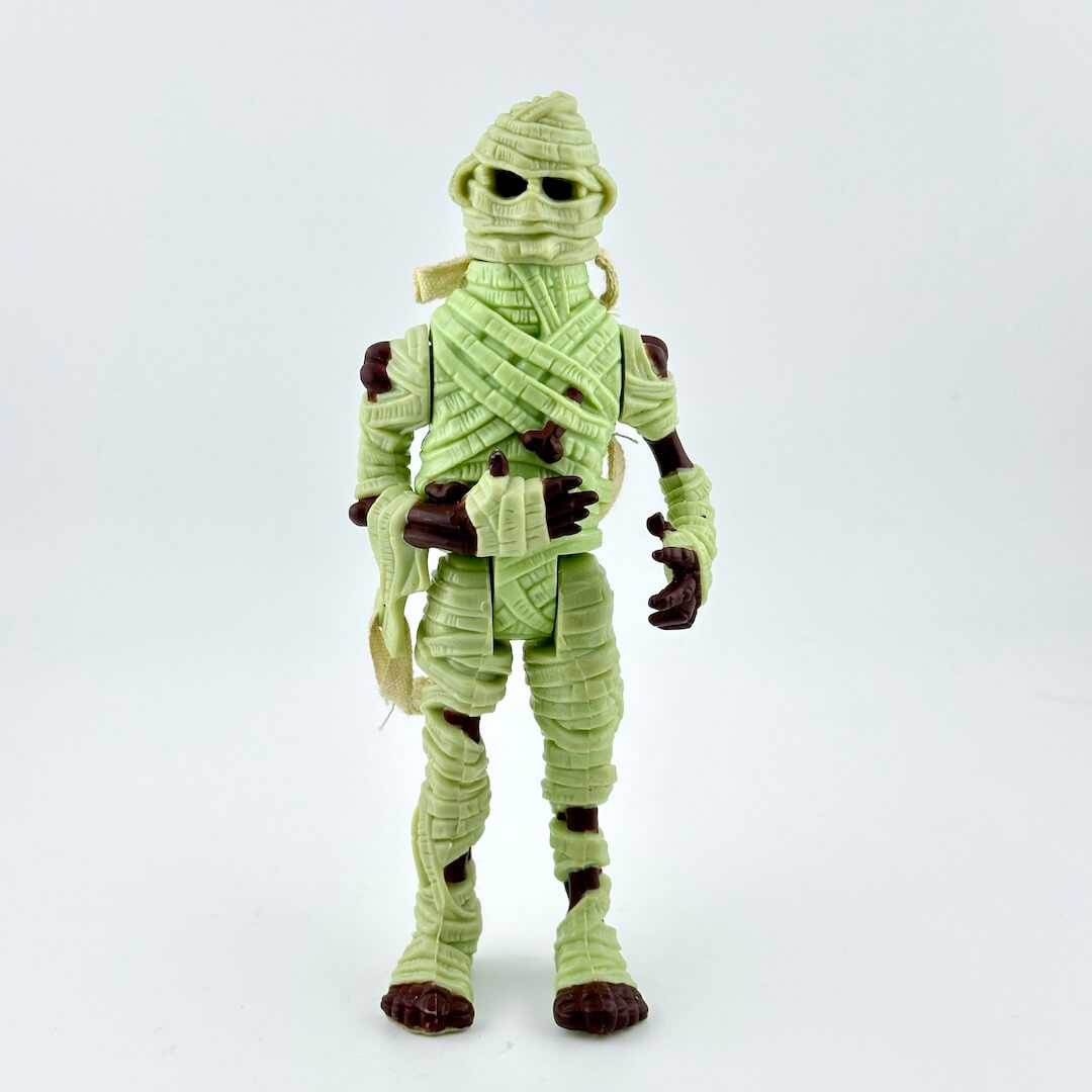 Action figure of a mummy character on a white background