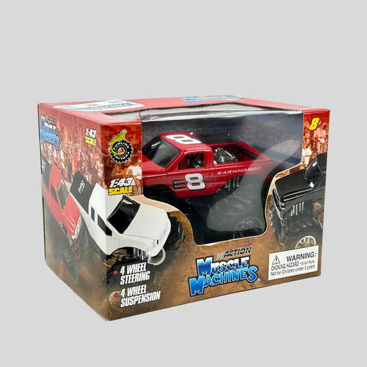 Boxed toy car with 'Action Muscle Machines' branding on a white background