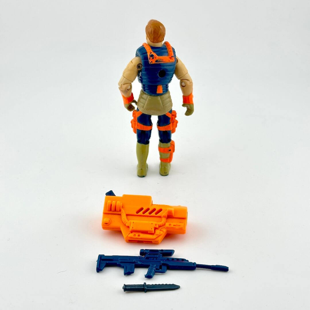 GI Joe action figure in orange and navy blue with accessories on white background. 