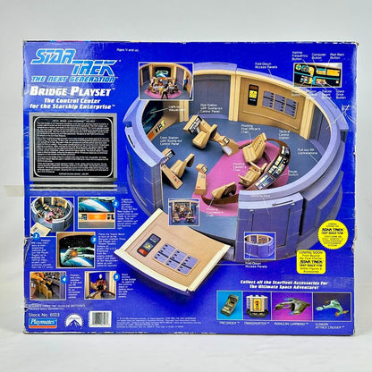 Boxed Star Trek bridge playset with detailed illustrations on a gray background