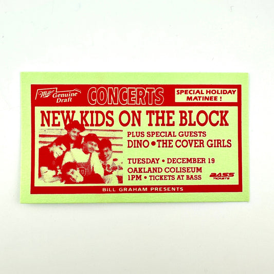 A vintage concert ticket for New Kids on the Block, featuring red text and band photos on a pale yellow background.