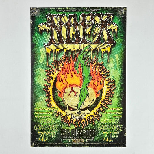 Vintage-style concert poster with a skull, flames, and text on a green background