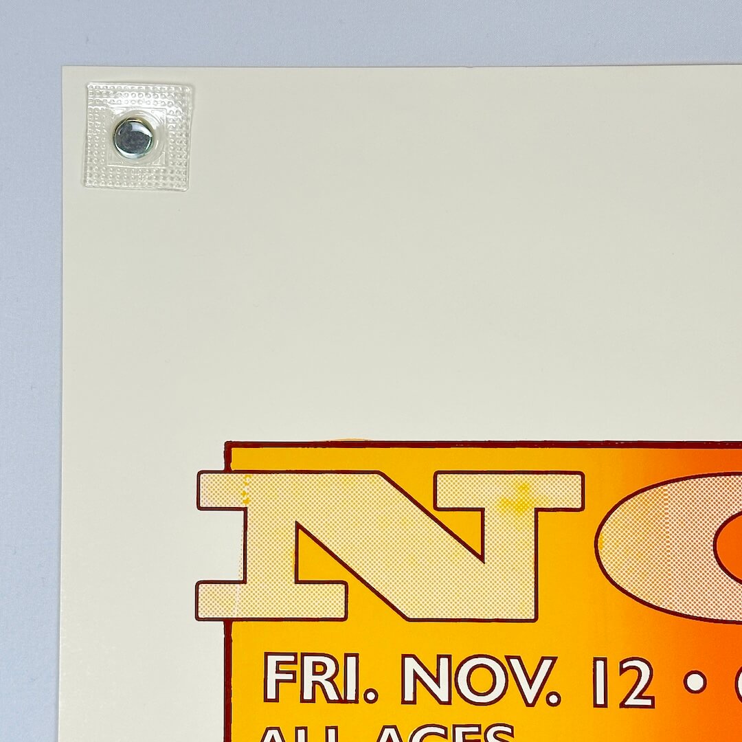 Top left corner of poster with crisp edges and corner. 