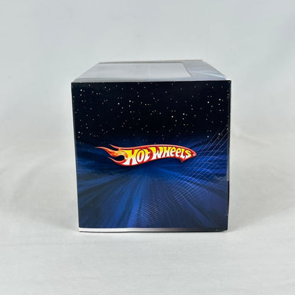 Side view of ship packaging featuring Hot Wheels branding on blue and black background. 