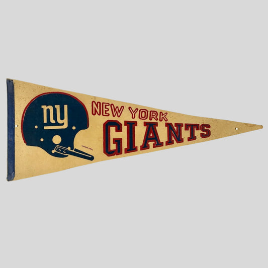 White discolored pennant with blue helmet with white "ny" next to city & team names in varsity letters with red outlines. 