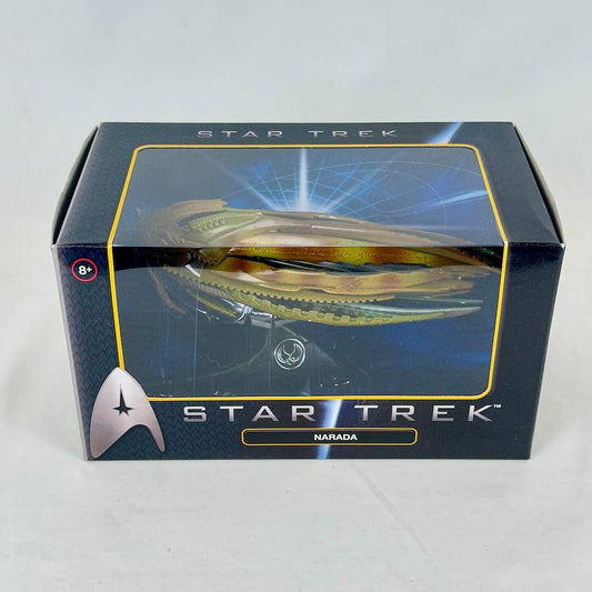 Diecast model spaceship inside packaging with Star Trek branding against white background.