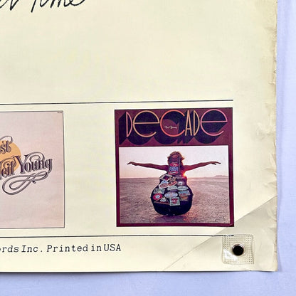 Bottom right corner with crumpled edge and crease across corner. 