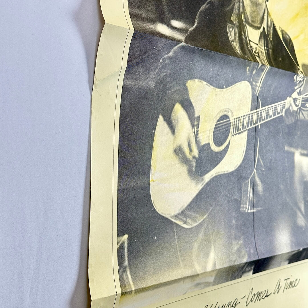 Side view of poster to show original creases.