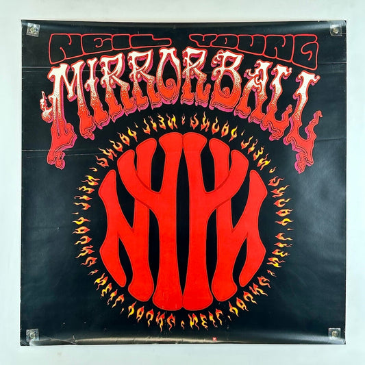 Promo poster for Neil Young with red, flaming graphic under stylized text for album name. 