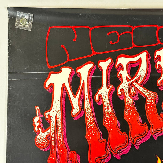 Top left corner with edge wear and creases. 