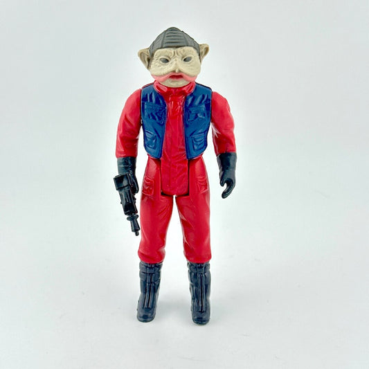 Toy figure in red and blue outfit with helmet on a white background