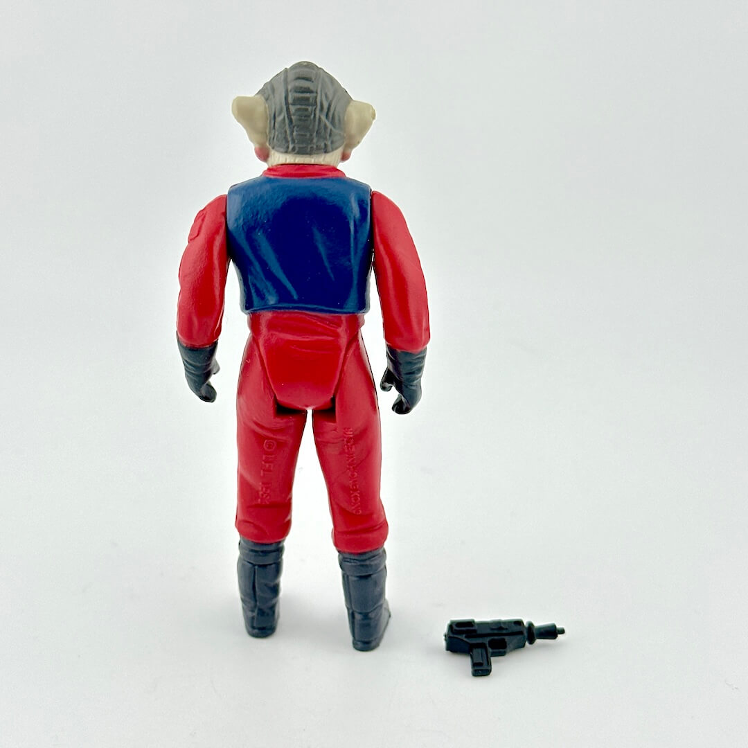 Action figure in red and blue suit with helmet on a white background