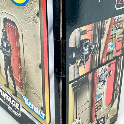 Close-up of tape seal on side of box, showing that its intact and never opened. 