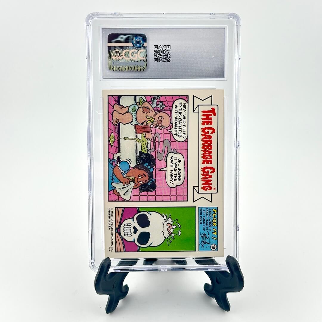 Trading card of The Garbage Gang in a protective case with a grading label.