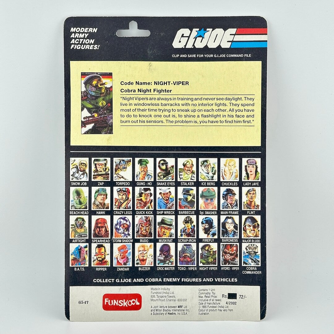 Back of GI Joe action figure in packaging against white background. 