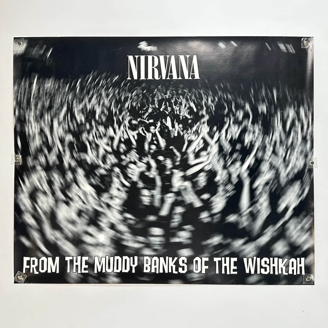Nirvana album cover with swirling design and text on a white background
