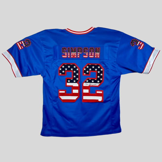 Blue baseball jersey with 'SIMPSON 32' printed on a white background