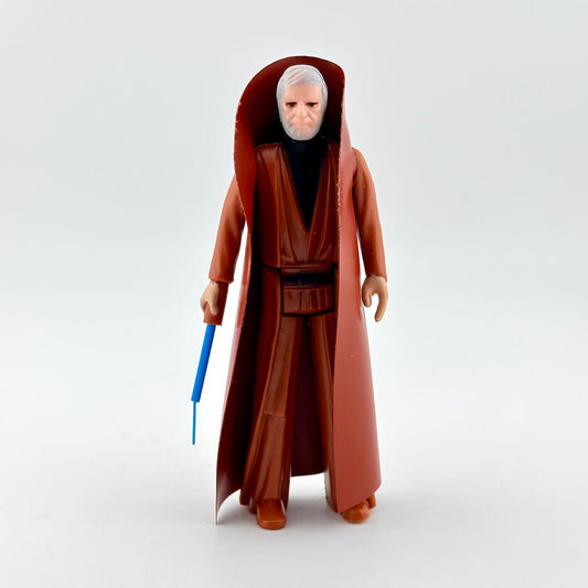 Action figure in a brown robe with a blue lightsaber on a white background
