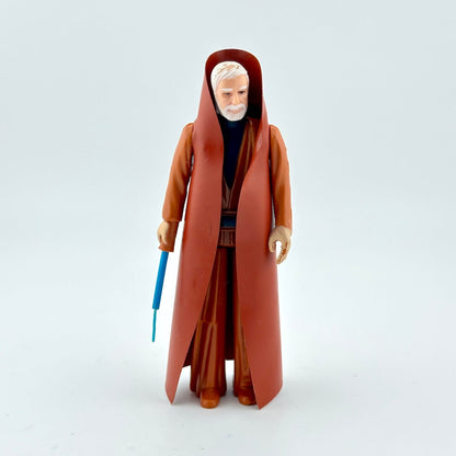 Action figure in a long brown robe holding a blue lightsaber on a white background