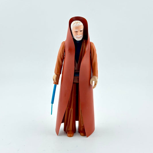 Action figure in a long brown robe holding a blue lightsaber on a white background