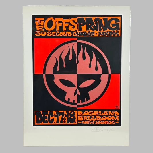 Orange & black check with alternating text colors concert poster with encircled skull with flaming top in center.