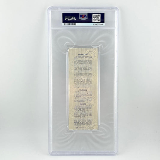 Vintage document in a clear protective case with PSA grading label on a white background