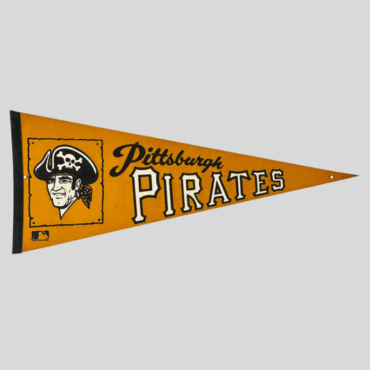 Light orange pennant with city name in script, team name in varsity letters, team logo at left.