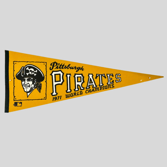 Yellow pennant with Pirate logo at left, city name in script, team name in varsity letters, 1971 World Champions at bottom.