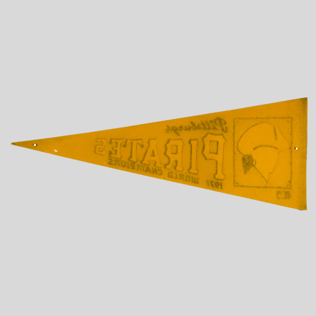 Backside of yellow pennant with ghost image of front graphics. 