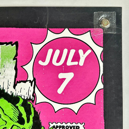 Pink circle with 'JULY 7' text on a black border