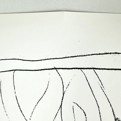 View of slight crease at top of poster. 