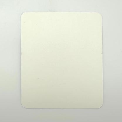 Backside of unused sticker against gray background. 