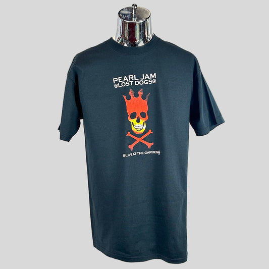 Black t-shirt with Pearl Jam graphic design on a mannequin against a white background