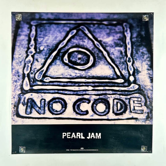 Poster for Pearl Jam's 'No Code' album with a stylized triangle and text design.