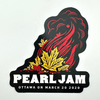 Pearl Jam event sticker with red and yellow maple leaves on a black background