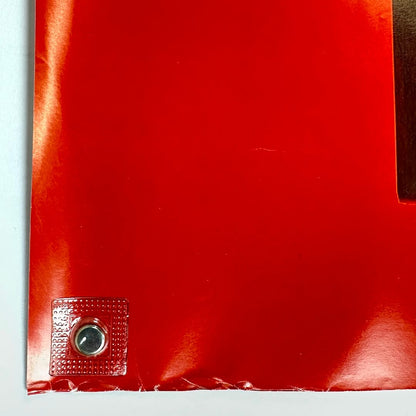 Bottom left corner of poster with wear to bottom edge. 