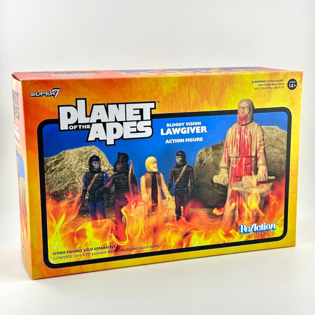 Planet of the Apes Bloody Lawgiver action figure box by Super7, featuring a fiery orange and yellow package design.