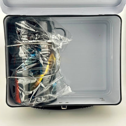 Interior of lunchbox showing matching thermos in original plastic. 